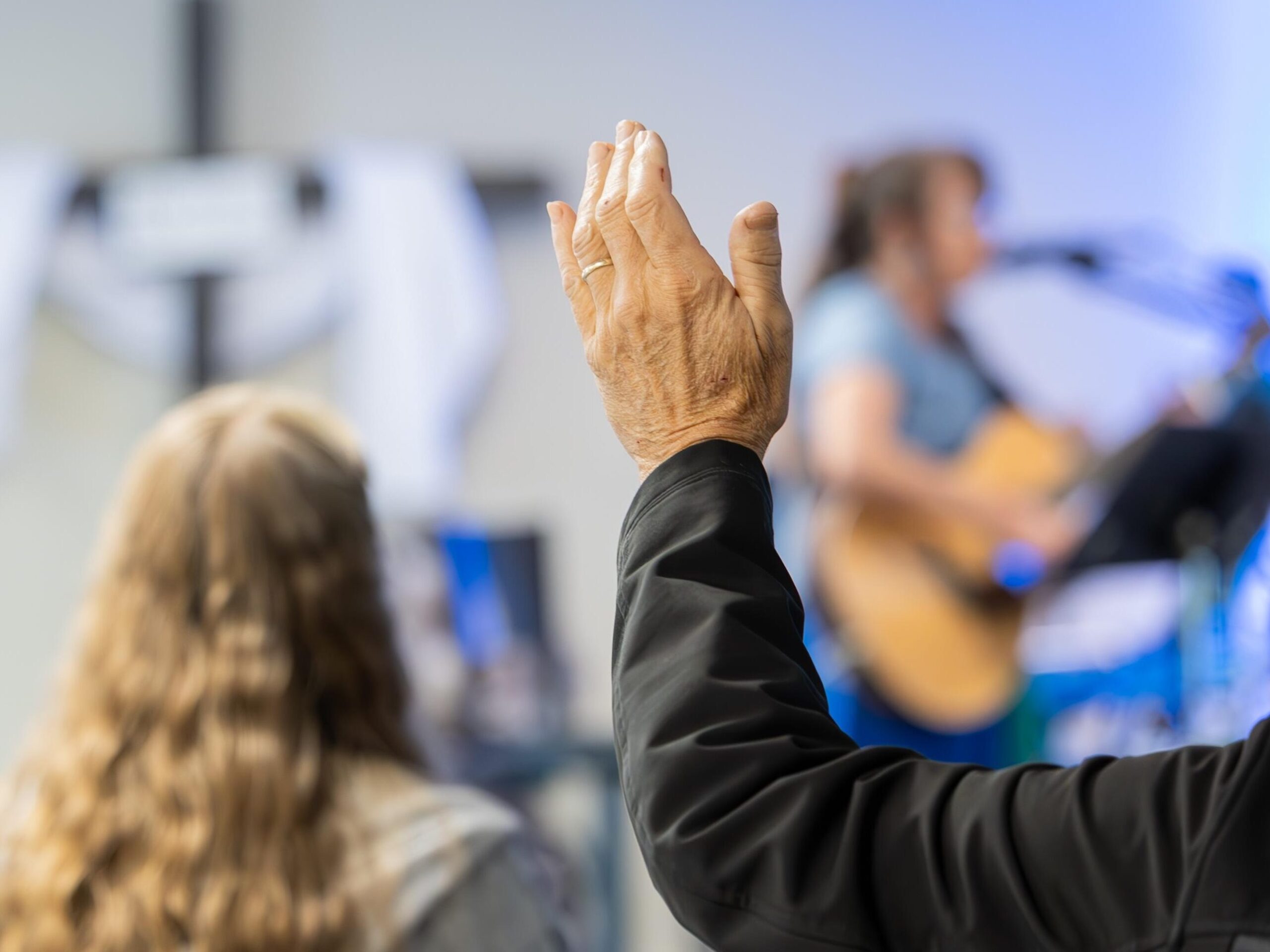 Hand raised during worship
